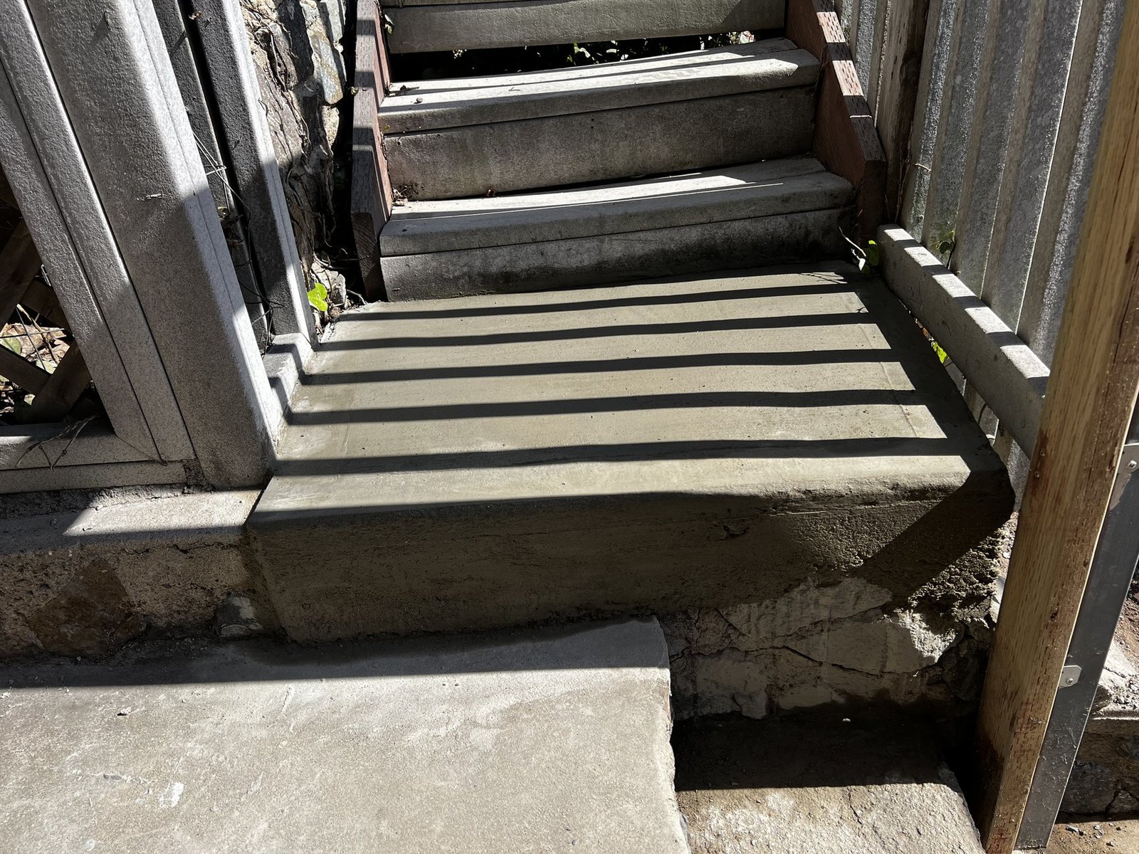 After: finished concrete step repair