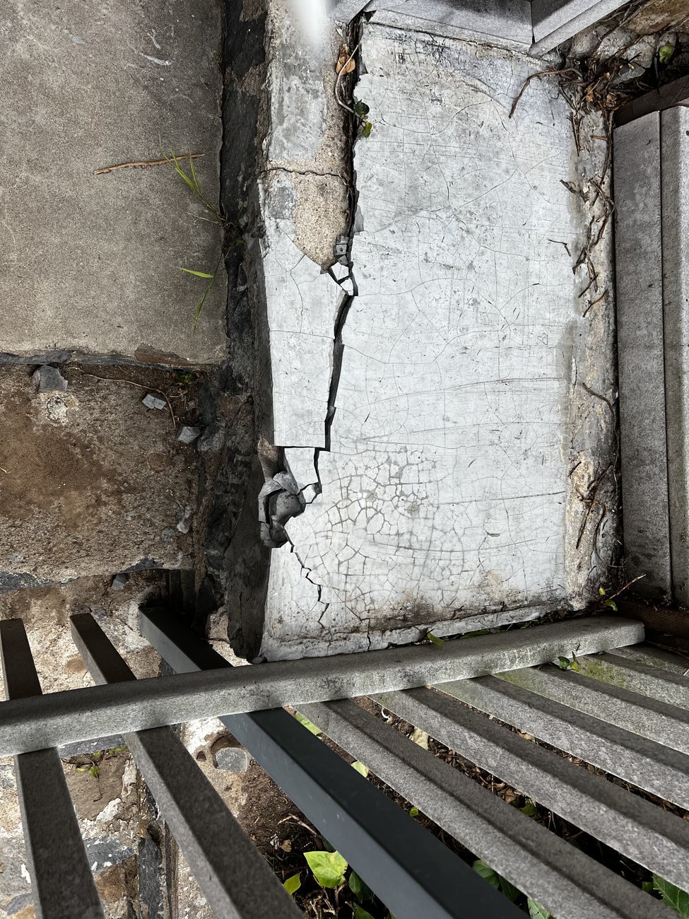 Before: broken concrete step in San Diego