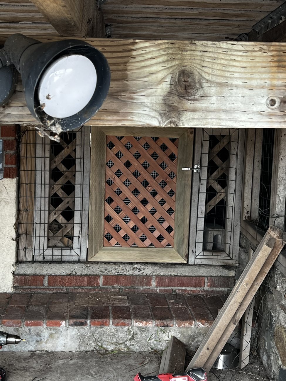 Under-deck access gate built by TrueCraft Home Repair
